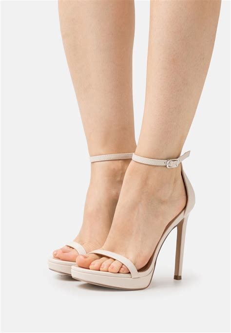 steve madden off white sandals.